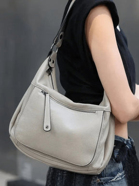 Sac en cuir gris vue détaillée nuage