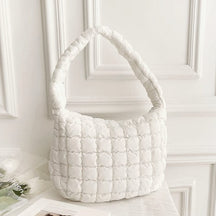 Détail coutures sac bandoulière crystal