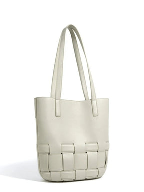Sac en cuir beige vue de côté doux