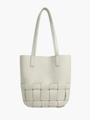 Sac en cuir beige vue de face soleil