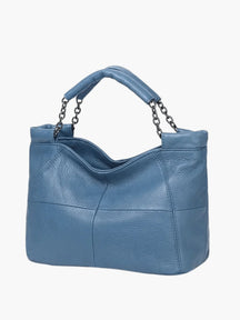 Détail couture sac cuir nature