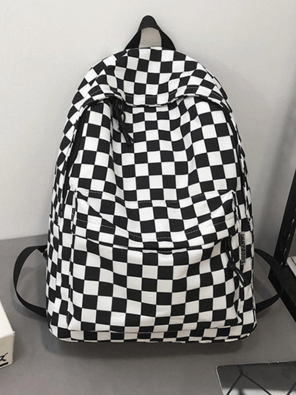 Sac à dos damier vue de côté étoile