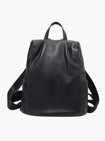Sac à dos en cuir noir vue de face soleil