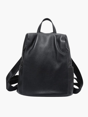 Sac à dos en cuir noir vue de face soleil