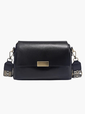 Sac en cuir noir élégant vue avant soleil