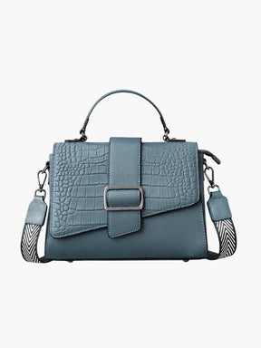 Sac en cuir motif alligator détail couture voyage