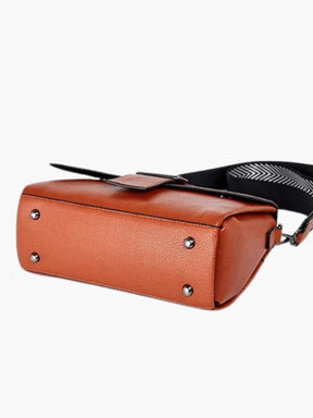 Sac en cuir motif alligator vue latérale songe