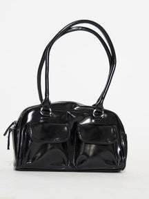Sac à main noir élégant brillant harmonie