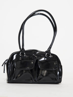Sac à main noir élégant brillant harmonie