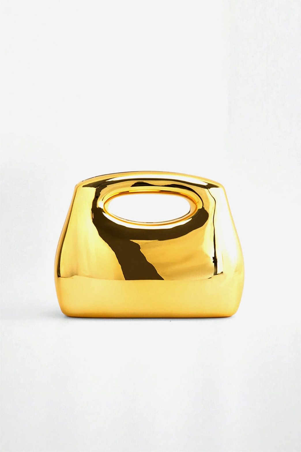 Sac à main doré métallique brillant soleil