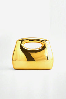 Sac à main doré métallique brillant soleil