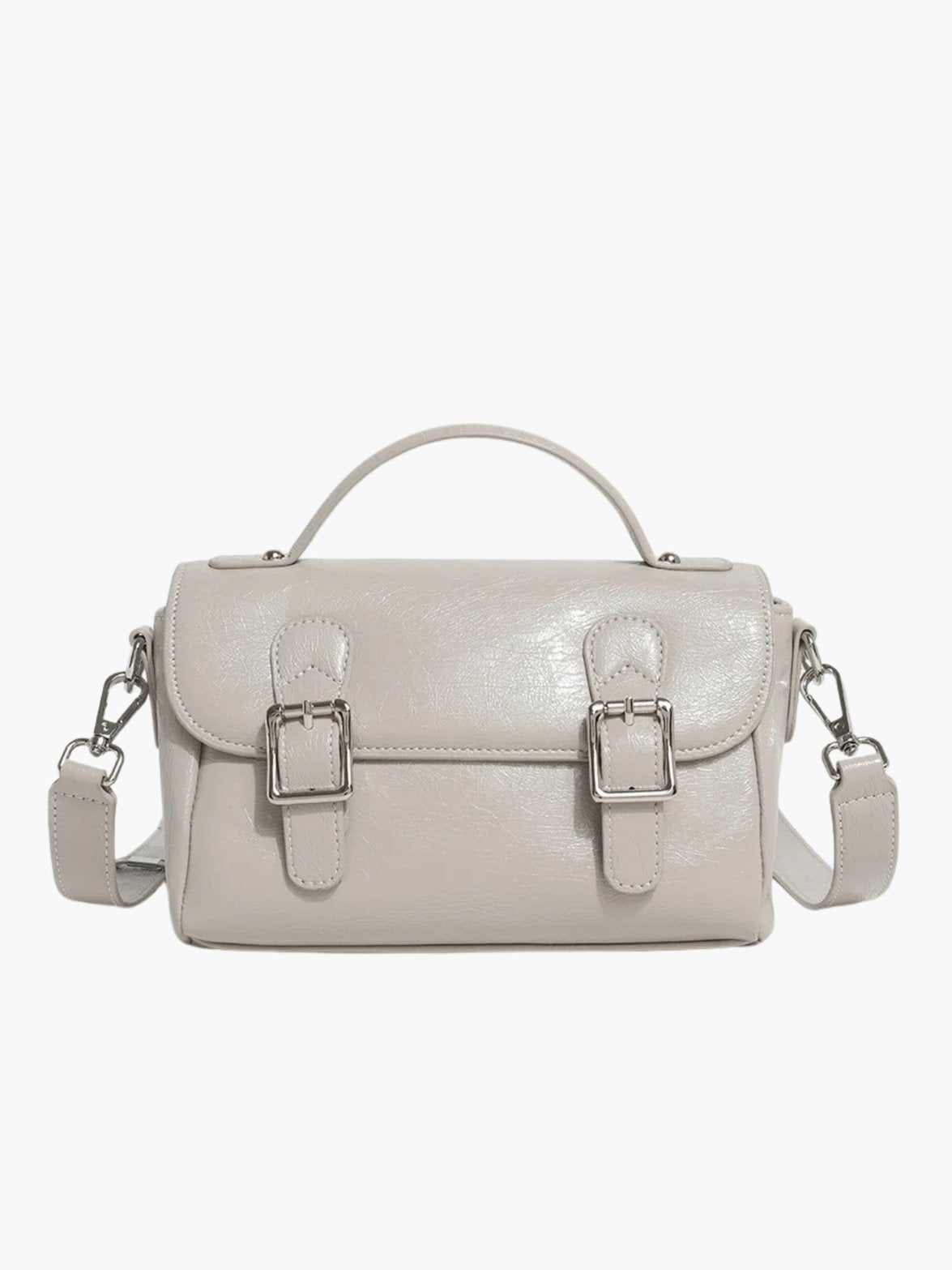 Sac en cuir rose porté épaule vent
