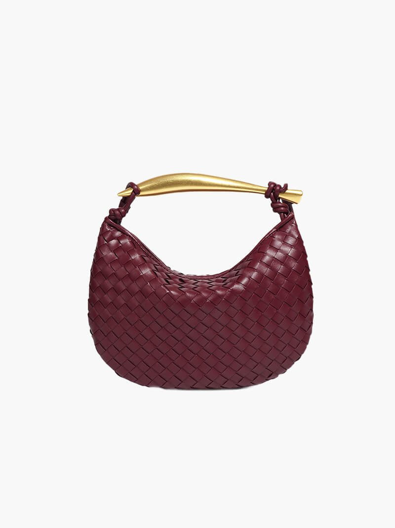 Sac à main tressé bordeaux avec poignée dorée éclatant