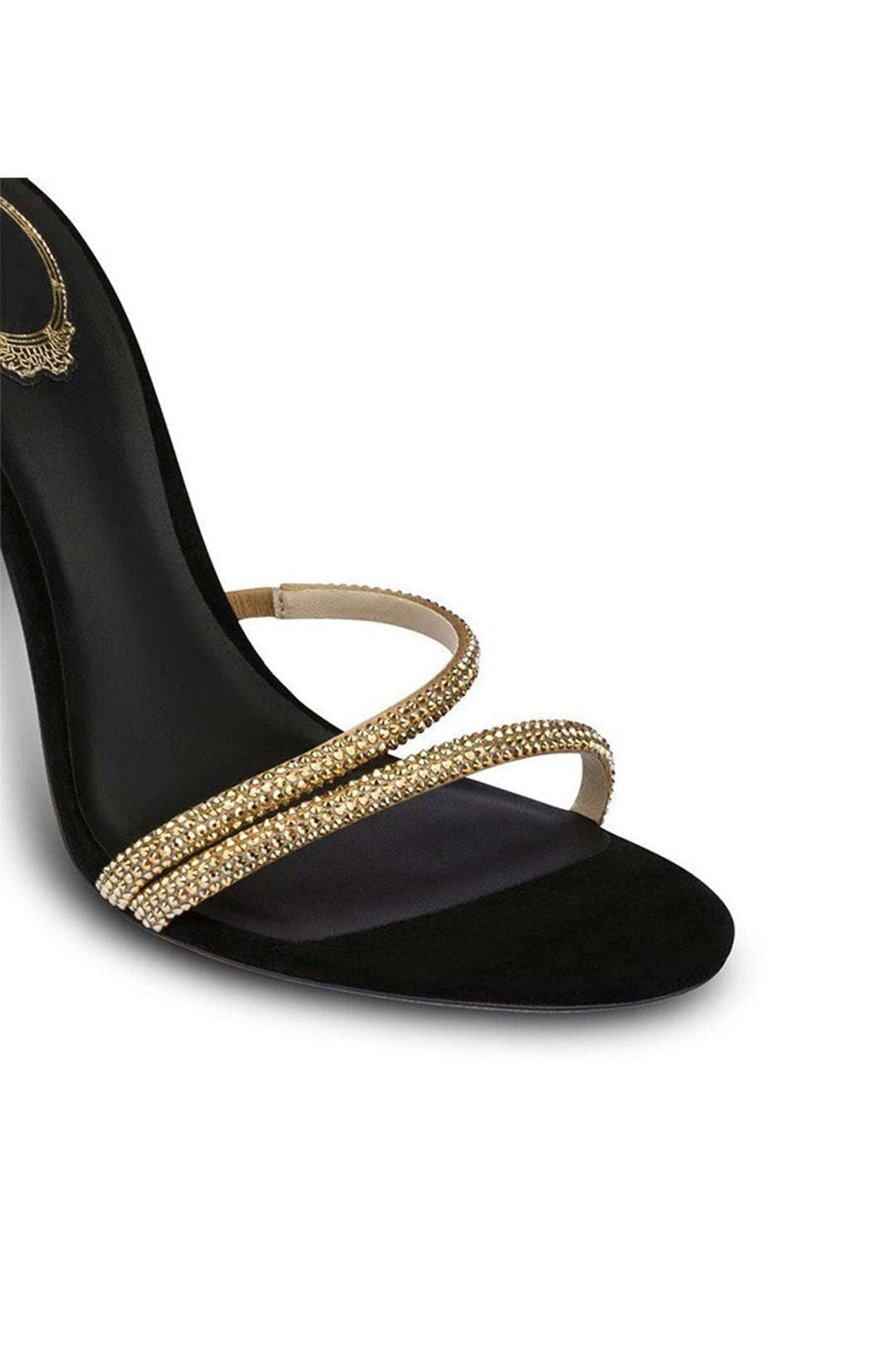 Vue latérale des sandales à lanières dorées féerique