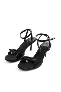 Sandales noires élégantes à talons stiletto avec nœud décoratif papillon