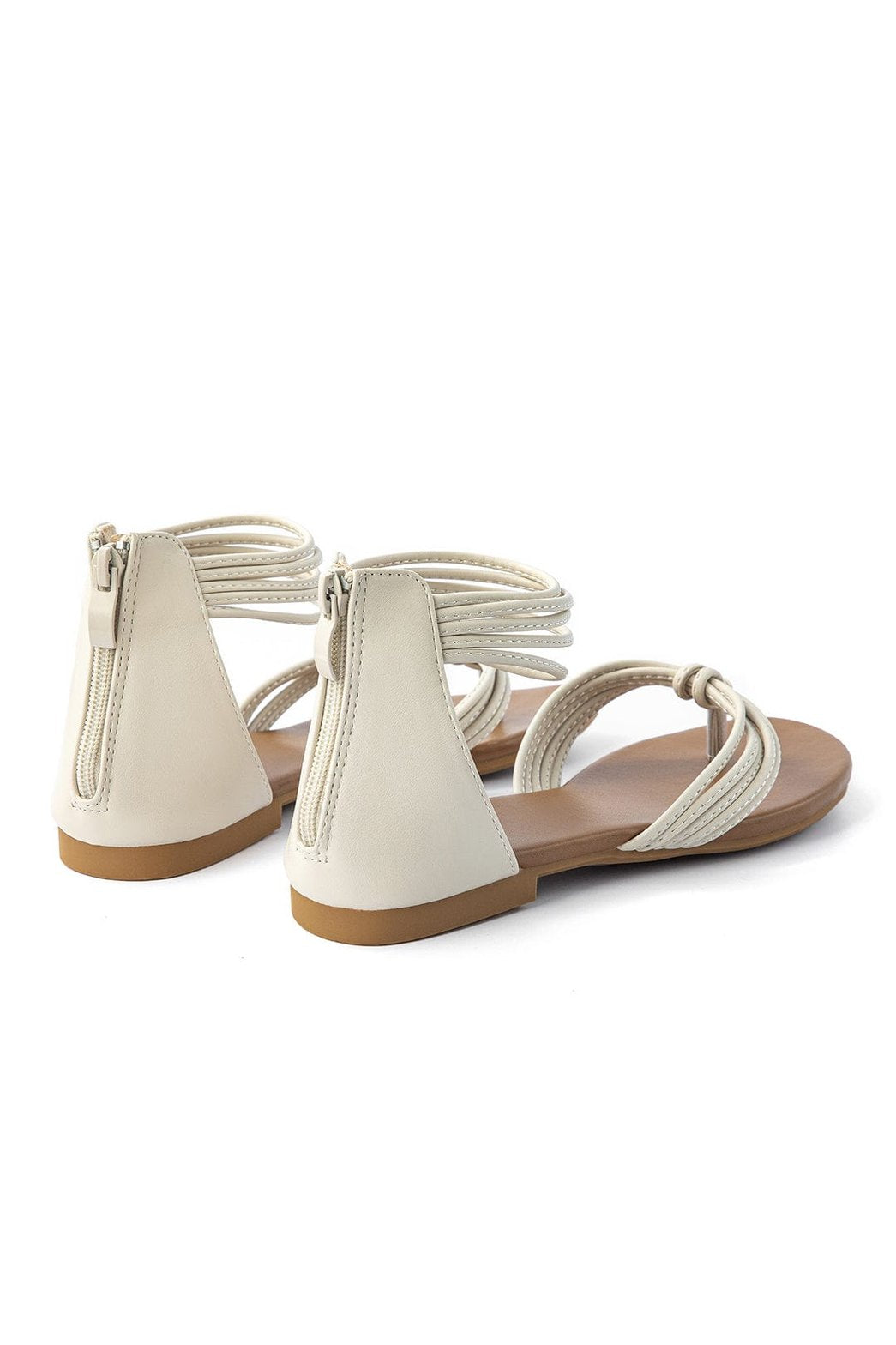Vue arrière des sandales plates en cuir blanc nuage