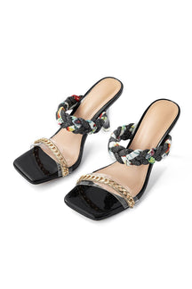 Sandales tressées noires avec chaîne dorée élégante - soleil