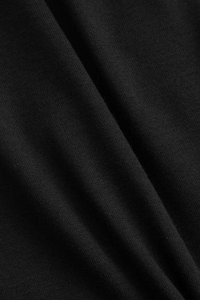 Top asymétrique métallique porté rubis