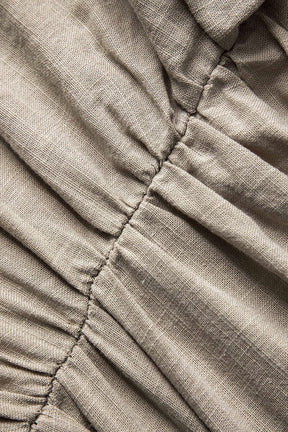 Top asymétrique beige en lin vue de dos léger