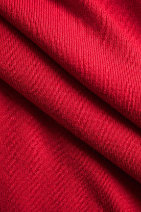 Top bardot rouge porté vue de profil lune