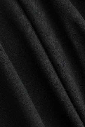 Top bardot noir drapé vue de côté étoile