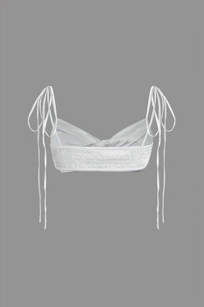 Détail des bretelles ajustables du top blanc légèreté