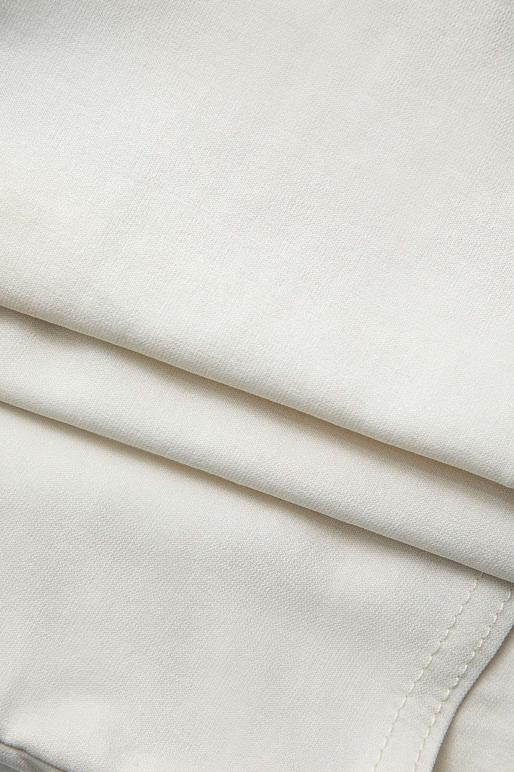 Top bustier blanc détails contrastés perle