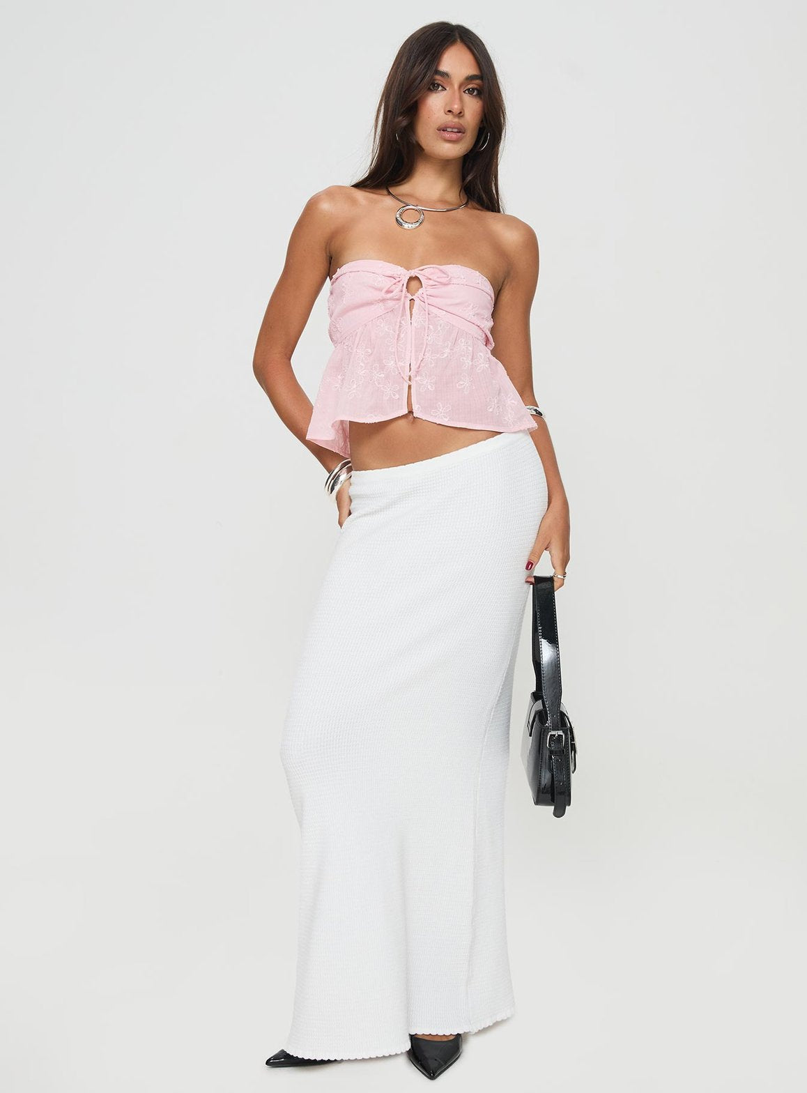 Détail des nœuds du top bustier rose nuage