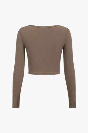 Top asymétrique côtelé beige vue de côté soleil