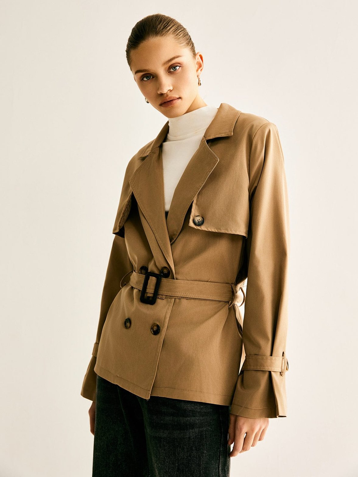 Trench beige détail manche pluie