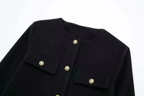 Veste sophistiquée détails dorés grâce