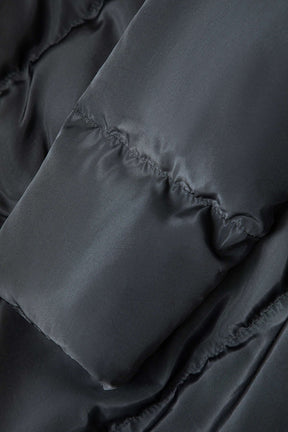 Détail matelassage veste noire nuage