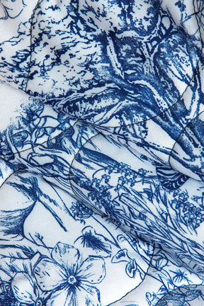 Détail motif floral veste légère fraîcheur