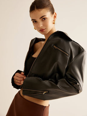 Détail des poches zippées de la veste lin