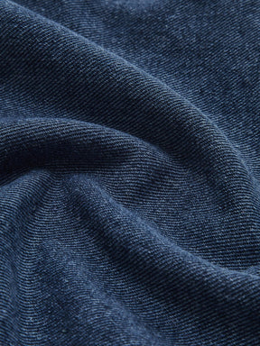 Détail boutons veste en jean aube