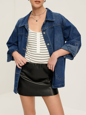 Détail manche veste en jean nuage