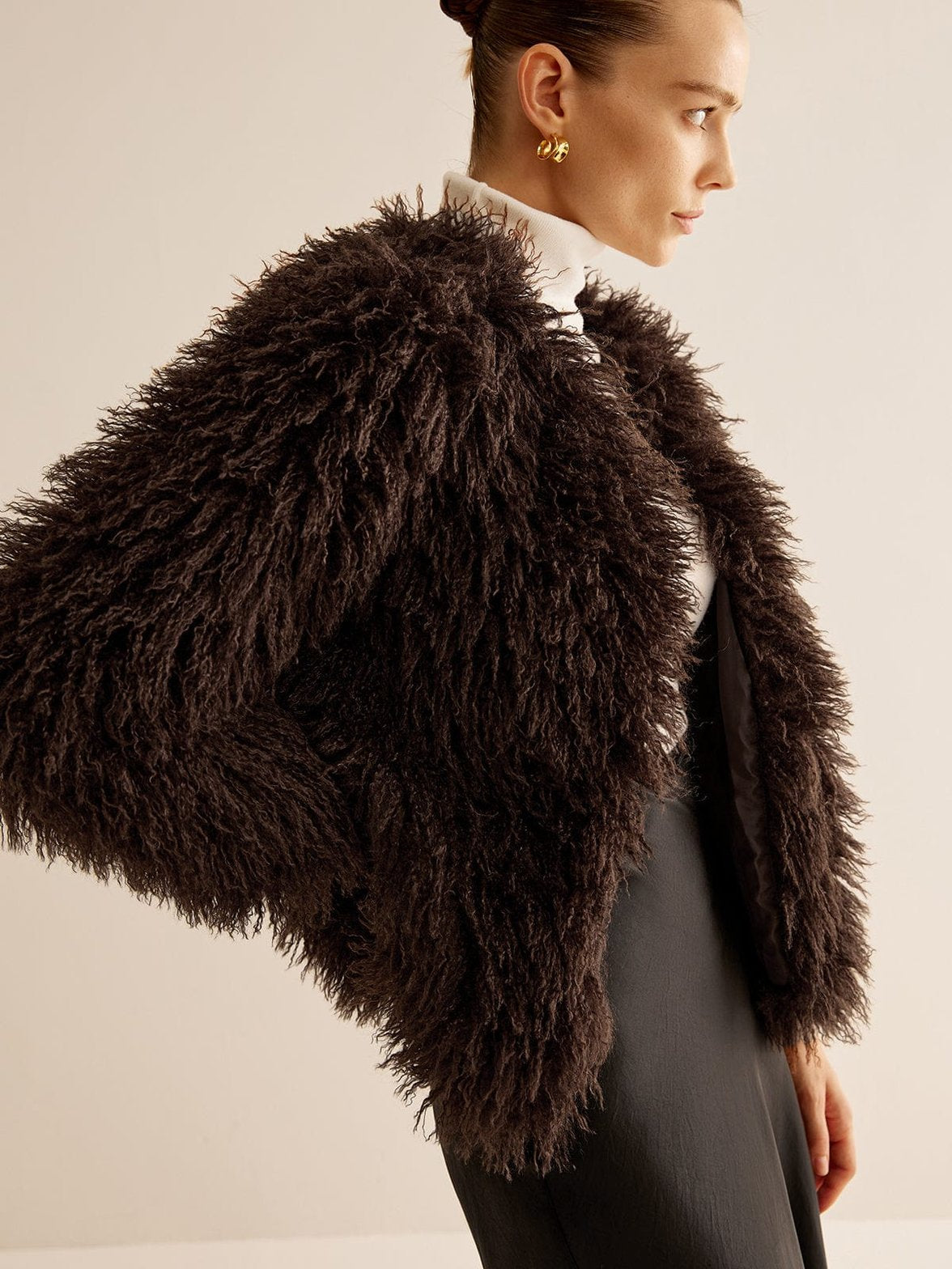 Veste fourrure synthétique marron portée pluie