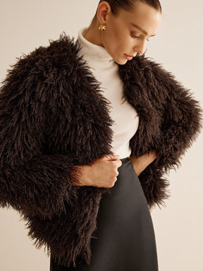 Veste fourrure synthétique marron vue de côté nuage