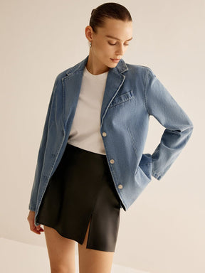 Veste en jean délavé style blazer vue de face soleil