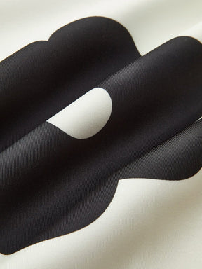 Veste fleurie motif contrasté profil légèreté