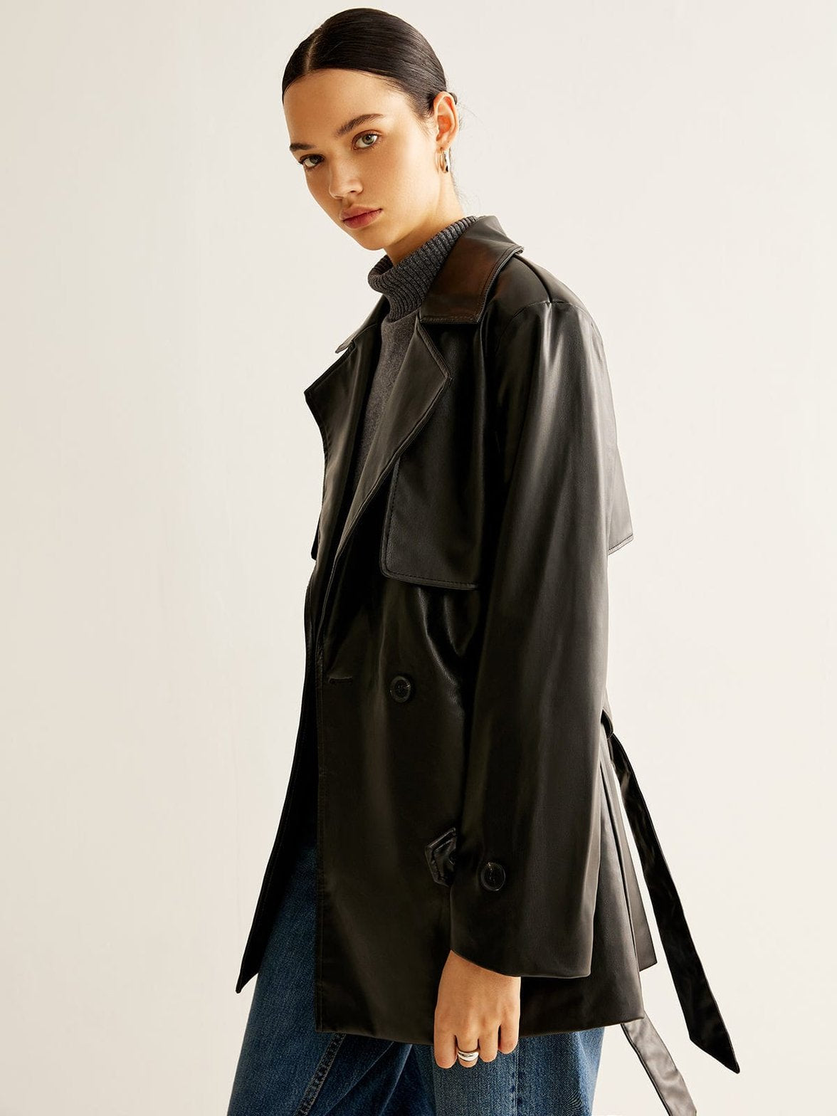 Vue dos veste style cuir ceinturée distinction