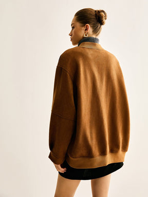 Veste en simili cuir détail des finitions jade