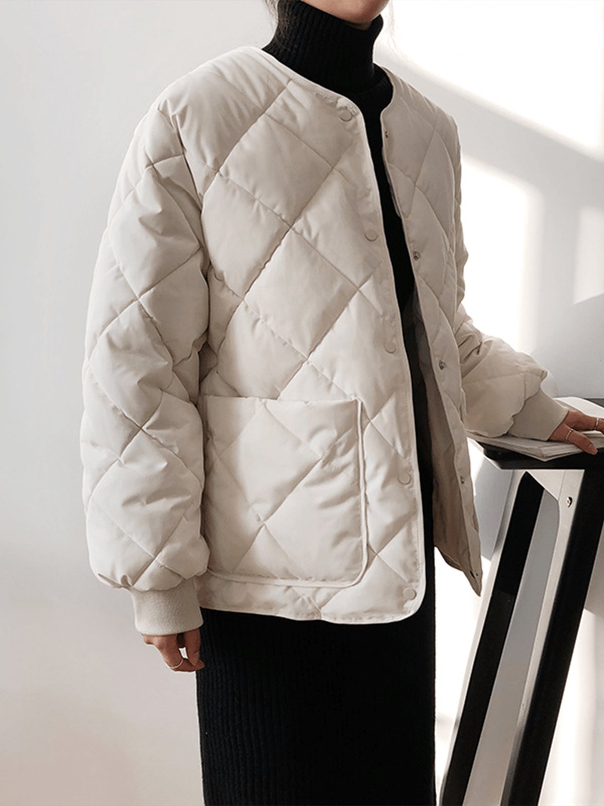 Veste matelassée beige détail couture légèreté