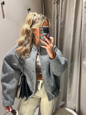 Veste grise oversize vue latérale étoile