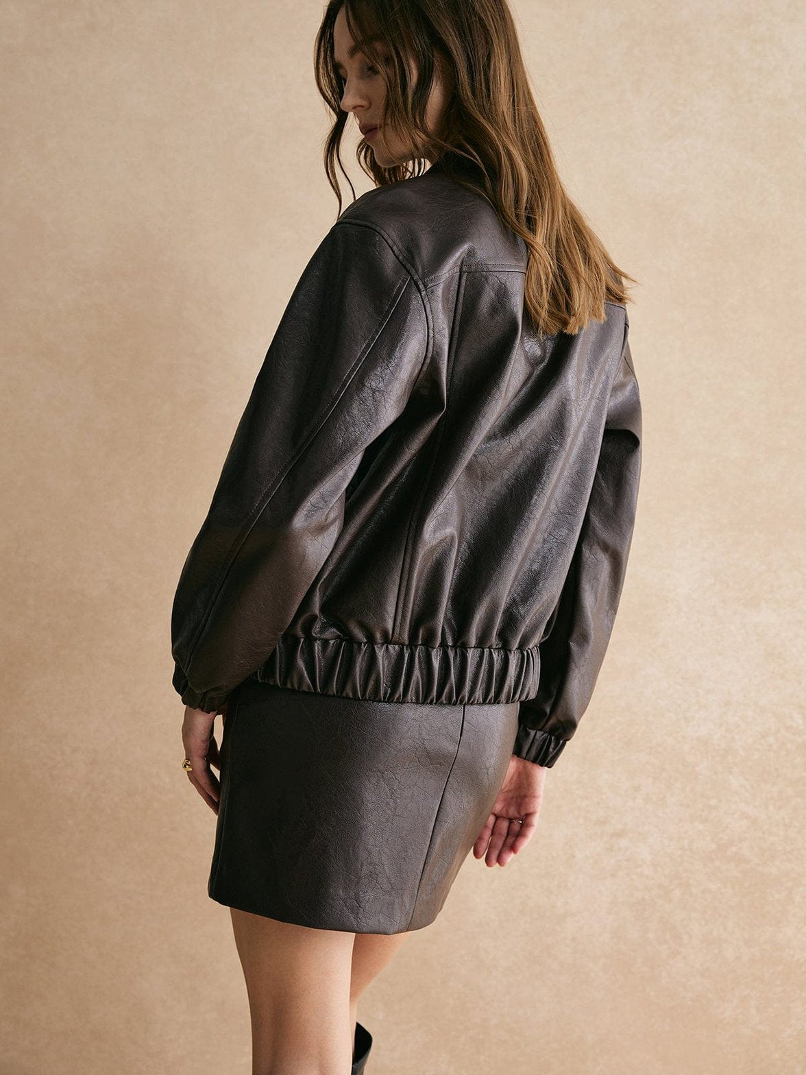 Veste simili cuir marron détail col vent