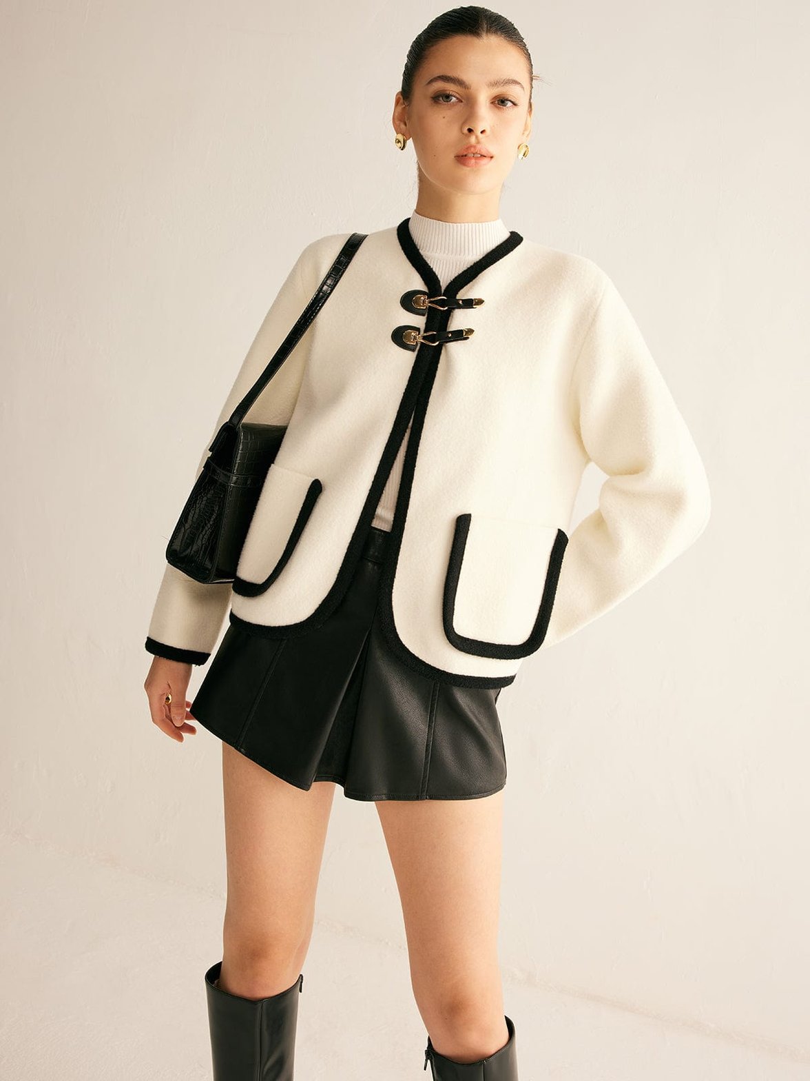 Veste tweed détail poches plume