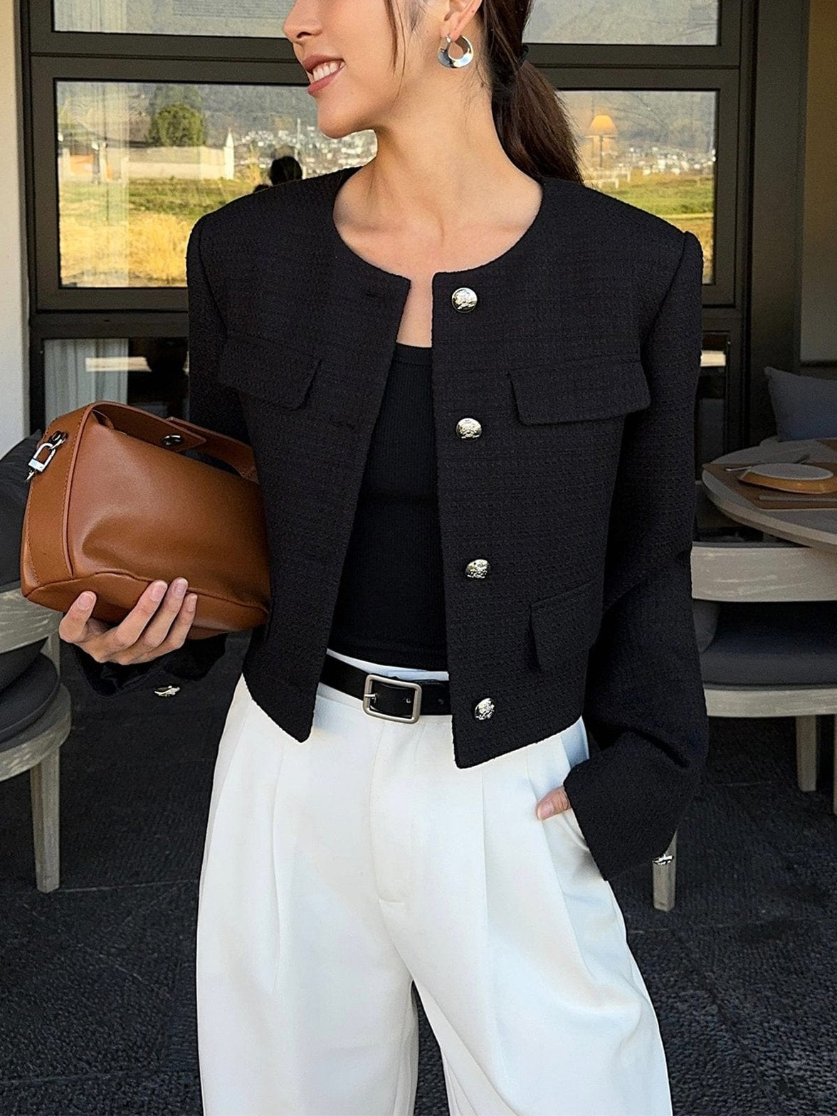 Veste tweed noire élégante vue de face douceur