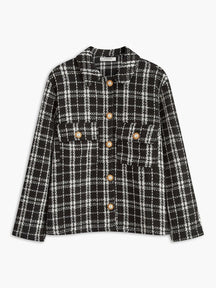 Veste tweed noir et blanc à carreaux élégante harmonie