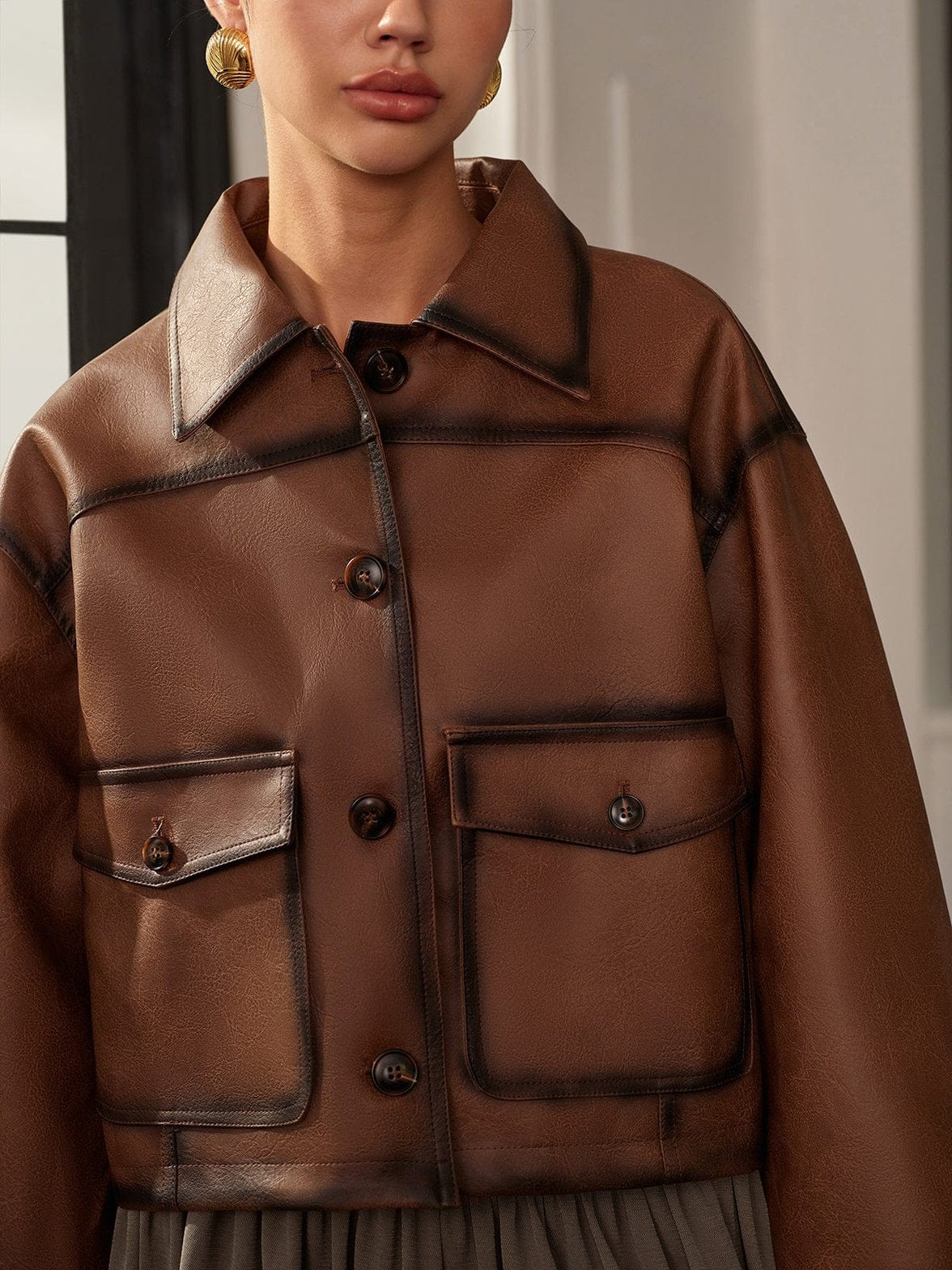 Veste vintage en simili cuir détail des finitions nuage