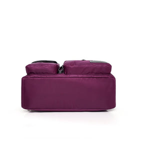 Sac à dos violet prune jolieandjuliette fonctionnel poches multiples base plate élégant